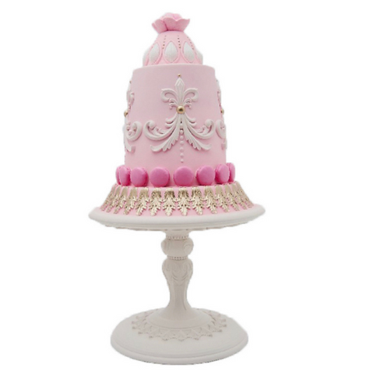 Pink Decorated Cake on White Cake Stand Decor